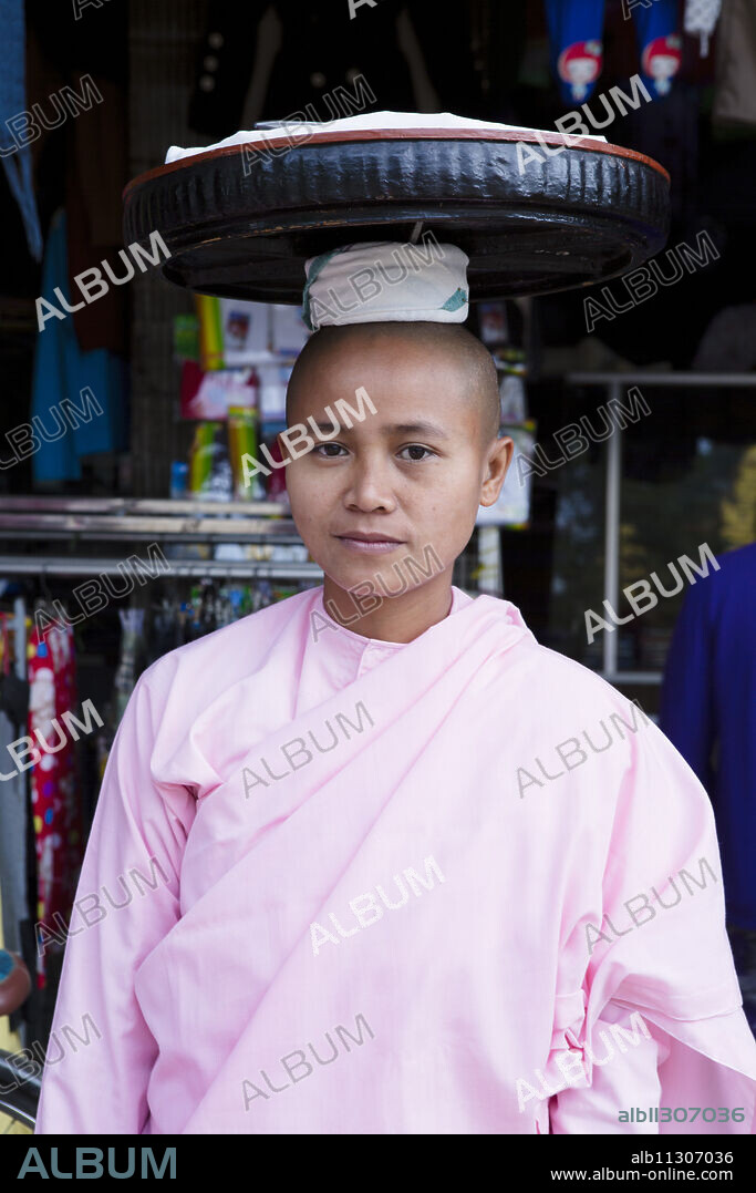 Buddhist nun in traditional robes, Monywa, Sagaing, Myanmar, Southeast Asia.