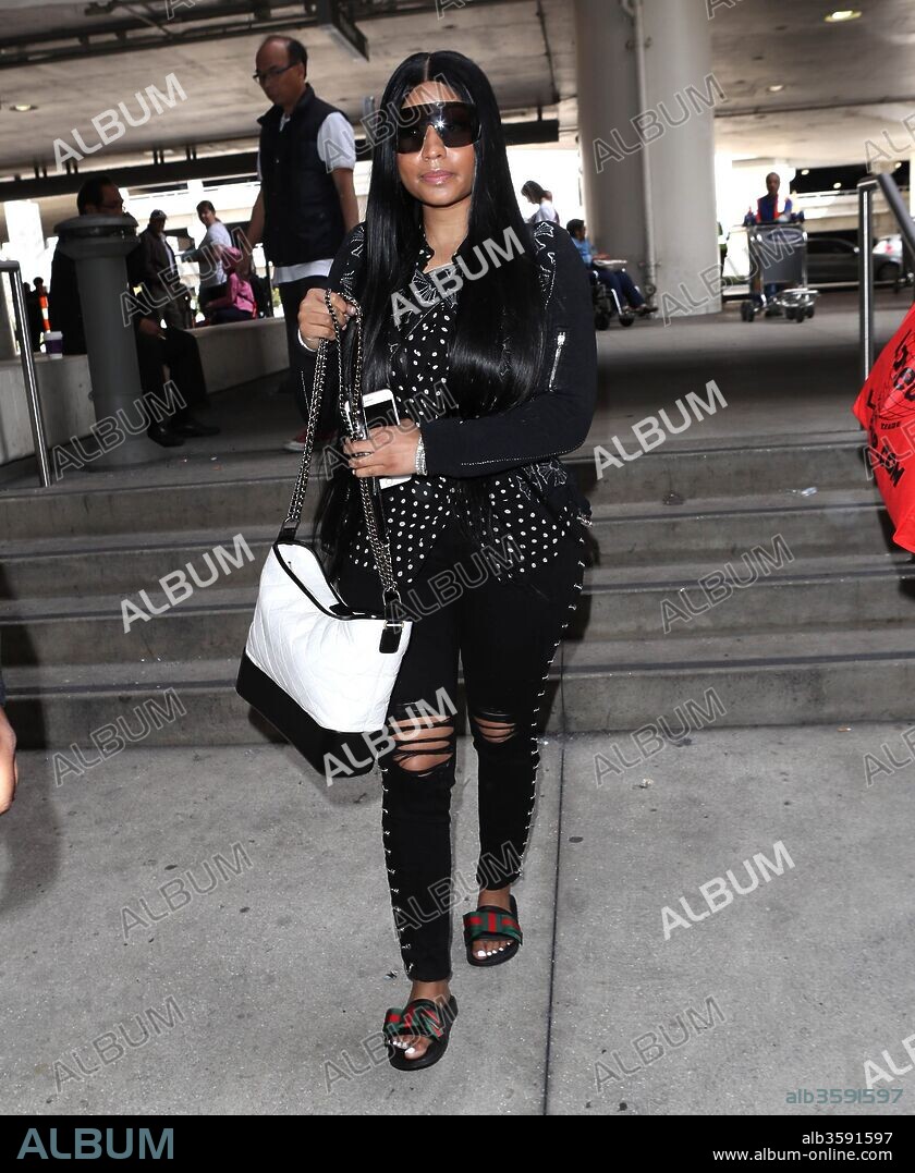 April 3, 2018 - Los Angeles, California, USA - 4/3/18.Nicki Minaj is seen at LAX Airport in Los Angeles, CA. 03/04/2018