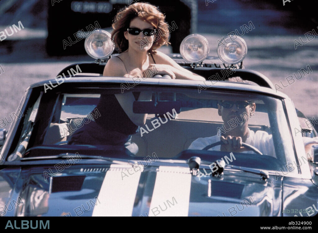 PIERCE BROSNAN und RENE RUSSO in THE THOMAS CROWN AFFAIR, 1999, unter der Regie von JOHN MCTIERNAN. Copyright UNITED ARITSTS / WETCHER, BARRY.