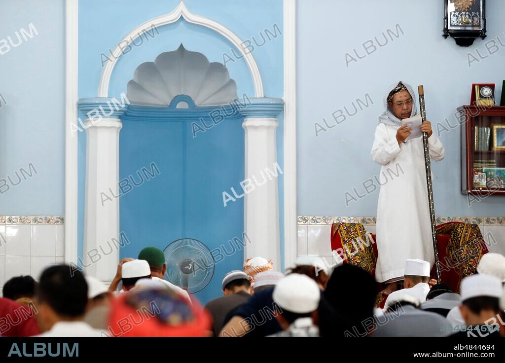 Cholon Jamail Mosque. The friday prayer (jummah). Imam giving the sermon ( Khutbah). Ho Chi Minh City. Vietnam.