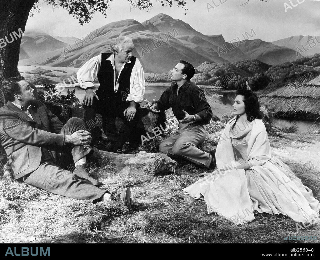 CYD CHARISSE, GENE KELLY and VAN JOHNSON in BRIGADOON, 1954, directed by VINCENTE MINNELLI. Copyright M.G.M.