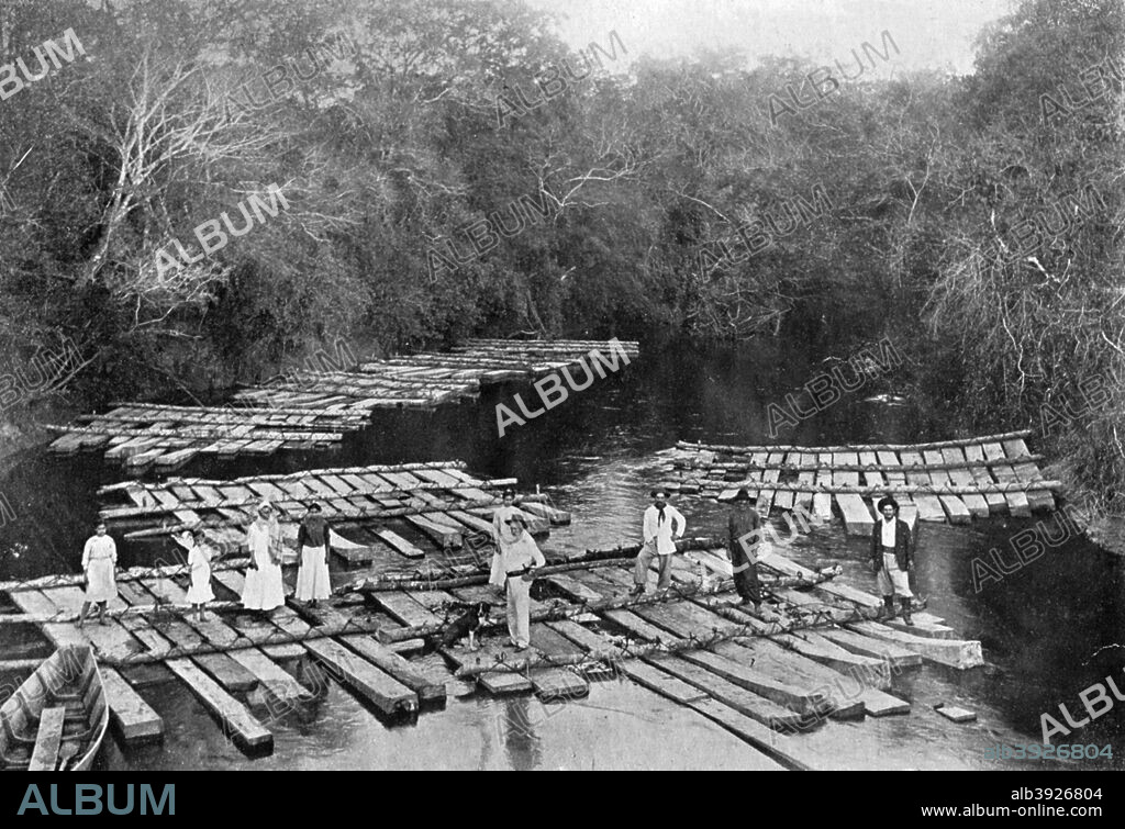 Rafts on the Tebicuary-mi River, Paraguay, 1911. A print from Picturesque Paraguay by Alexander K MacDonald, Charles H Kelly, London, 1911.