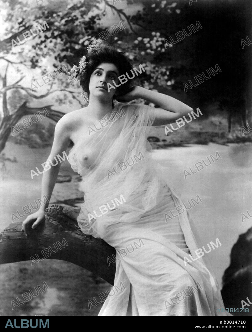 Entitled: "Young woman modeling: nude seated on log." Photographed by Fitz W. Guerin, 1903. Erotic photography is a style of art photography of an erotic and even a sexually suggestive or sexually provocative nature. Erotic photography is generally a composed image of a subject in a still position. Though the subjects of erotic photography are usually completely or mostly unclothed, that is not a requirement. Erotic photography should be distinguished from nude photography, which contains nude subjects not necessarily in an erotic situation, and pornographic photography, which is of a sexually explicit nature.
