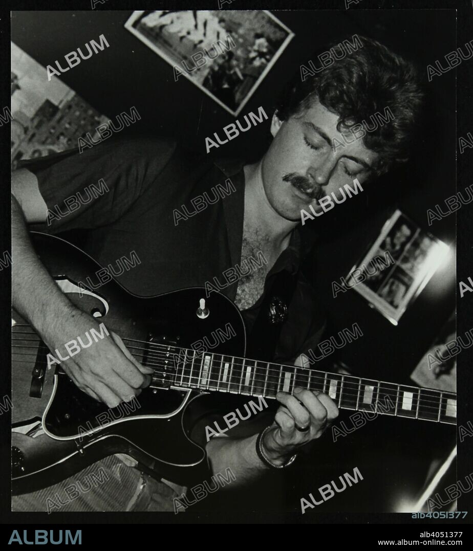 Guitarist Martin Taylor playing at the Middlesex and Herts Country Club, Harrow Weald, London, 1981.
