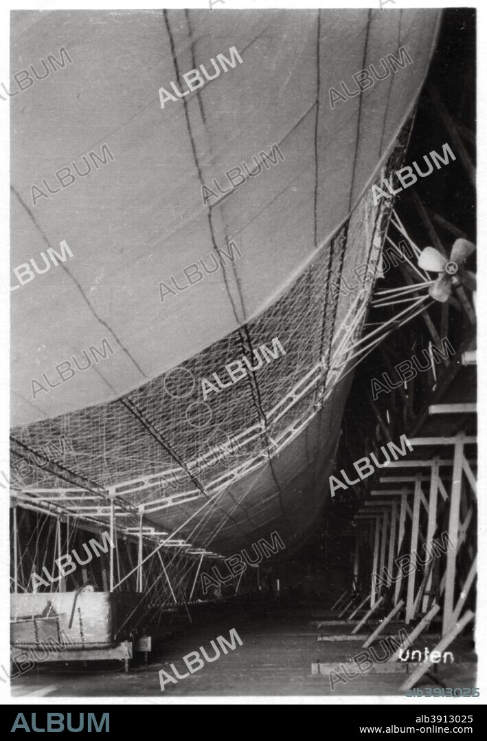 Airship LZ1 'Graf Zeppelin' under construction, 1899 (1933). LZ1 was the first of the Zeppelins. It was built in a floating hangar on Lake Constance and made its maiden flight on 2nd July 1900. A photograph from Zeppelin-Weltfahrten, Vom ersten Luftschiff 1899 bis zu den Fahrten des LZ127 Graf Zepplin 1932, Dresden, 1933.