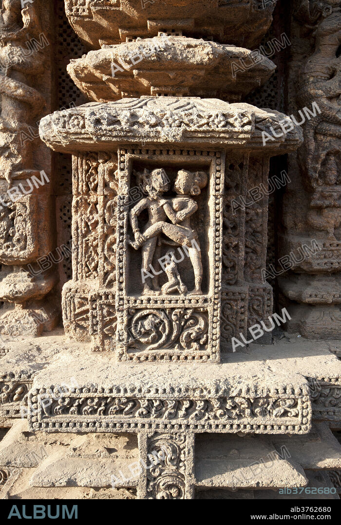 Erotic carving on the wall of the 13th century Konarak Sun temple, built as the chariot of Surya the Sun god, UNESCO World Heritage Site, Konarak, Orissa, India, Asia.