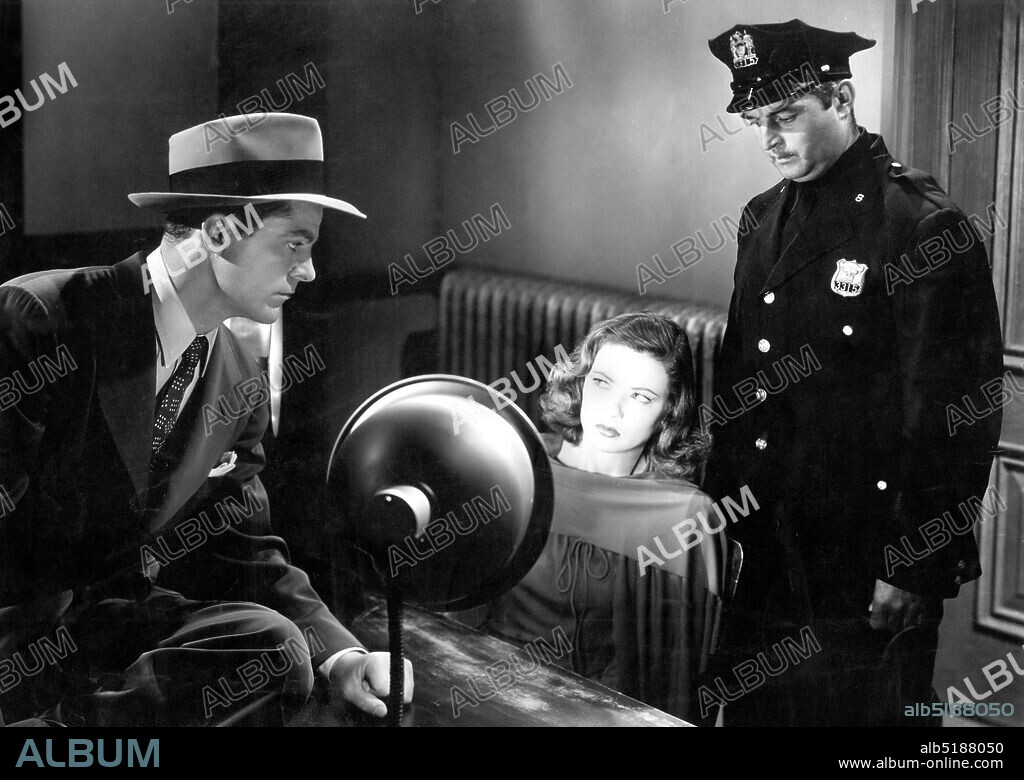 DANA ANDREWS y GENE TIERNEY en LAURA, 1944, dirigida por OTTO PREMINGER. Copyright Twentieth Century-Fox.