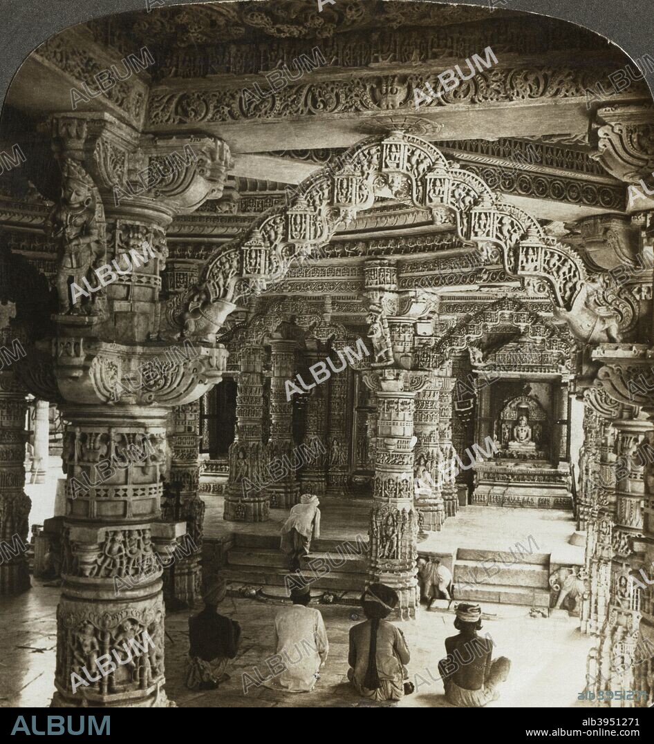 Temple of Vimal Vasahi, Mount Abu, Rajasthan, India. Interior of one of the Dilwara Temples, a group of Jain temples built by the Chalukyas at the hill station of Mount Abu between the 11th and 13th centuries. Built from white marble, they are famous for their intricate ornamental carvings. The Temple of Vimal Vasahi (Vimala Sah) is the oldest of the temples. It was built by Vimal Shah in 1021. Stereoscopic card detail.