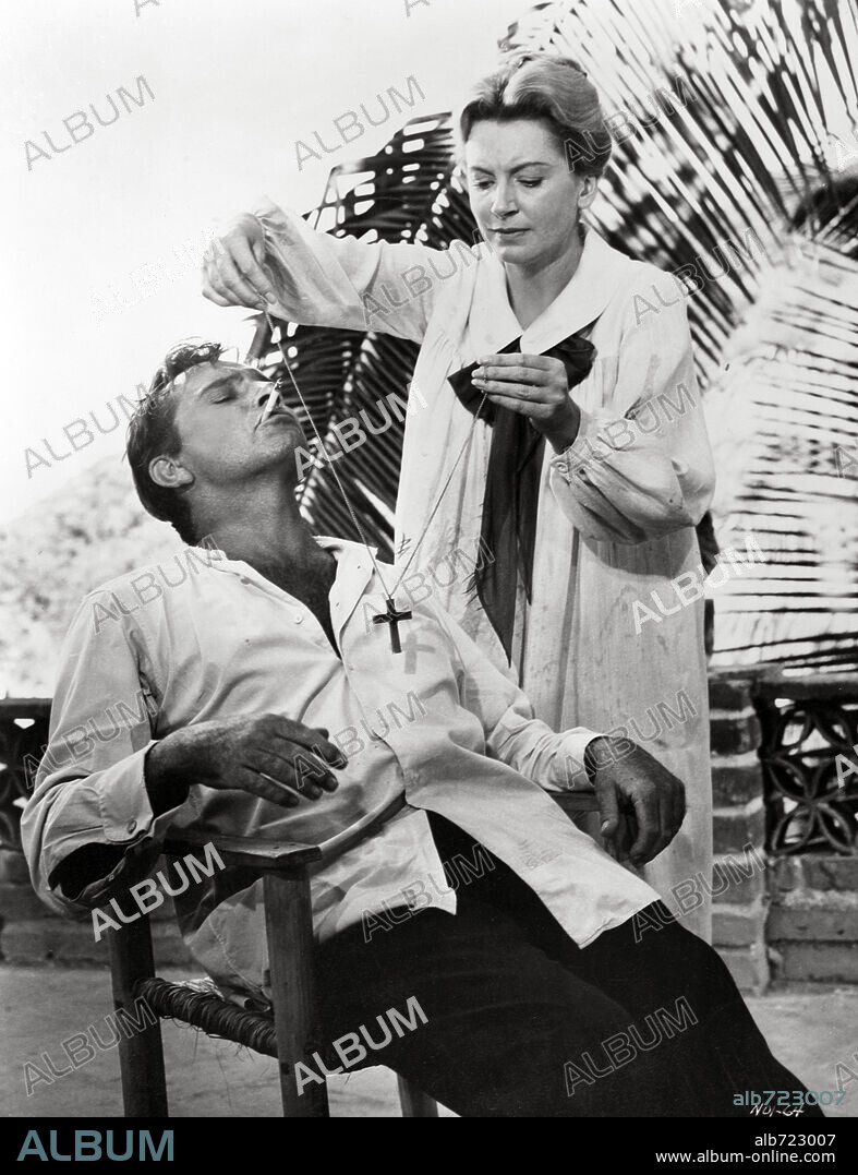 DEBORAH KERR and RICHARD BURTON in THE NIGHT OF THE IGUANA, 1964, directed by JOHN HUSTON. Copyright M.G.M.
