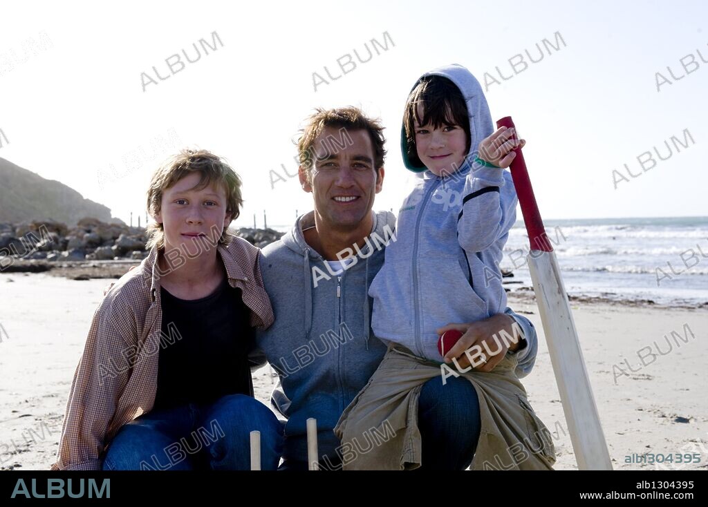 CLIVE OWEN, GEORGE MACKAY and NICHOLAS MCANULTY in THE BOYS ARE BACK, 2009, directed by SCOTT HICKS. Copyright AFFC/BBC FILMS/HOPSCOTCH PRODUCTIONS/SCREEN AUSTRALIA.