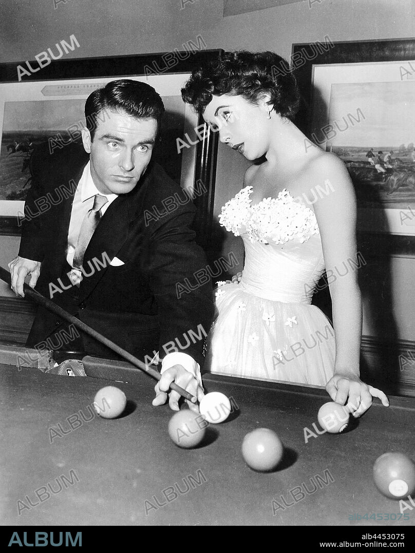 ELIZABETH TAYLOR and MONTGOMERY CLIFT in A PLACE IN THE SUN, 1951, directed by GEORGE STEVENS. Copyright PARAMOUNT PICTURES.
