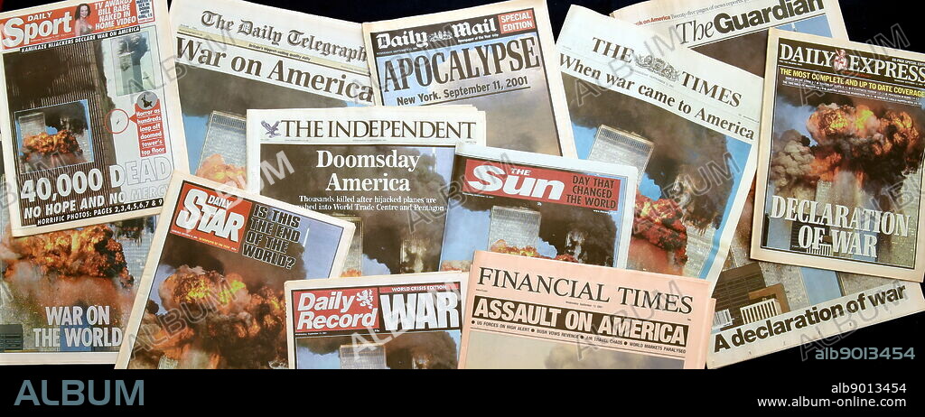 Newspapers reporting on the 9/11 attacks in New York.