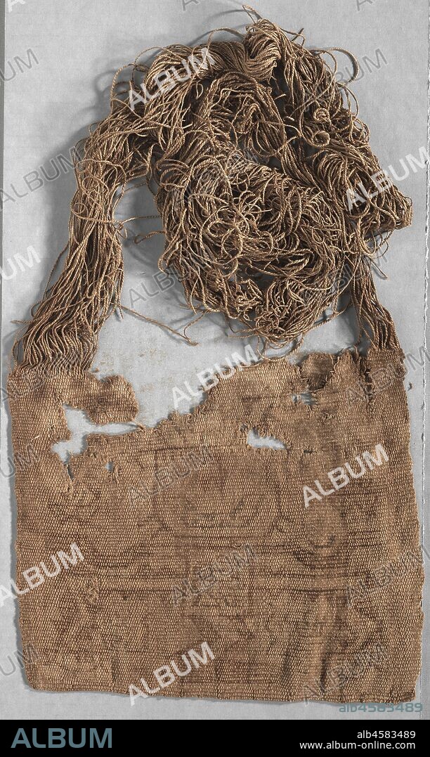 Mummy Bundle "Mask", 200 BC-1. The Paracas people of Peru's South Coast buried their dead in pear-shaped mummy bundles made of a seated human body carefully wrapped in garments and other textiles. Sometimes a painted cloth was placed at the top of the bundle, as though it served as the bundle's face, head, or "mask." The cloth was padded on the back so it curved outward like a face, and the tress-like yarns (unwoven warps) at the upper edge were arranged around a solid cotton disk that, in turn, was wrapped with a headband. Some cloths were painted with mask-like faces, and others with full figures, apparently mythical creatures.