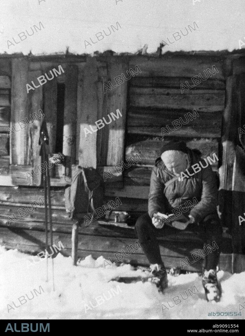 Pope John Paul II . reading his breviary during a skiing trip to the Tatras Mountains.