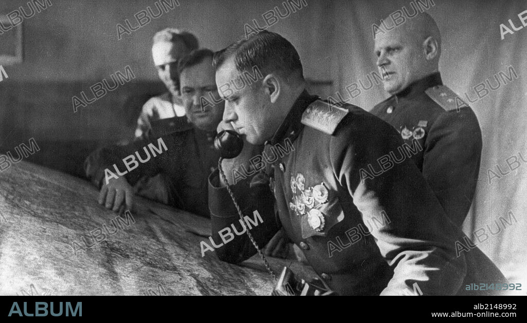 General konstantin rokossovsky, commander of the first byelorussian front, on the phone prior to the battle for stalingrad, on the right is lieutenant general telegin, member of the military council of the front. 01/02/2013