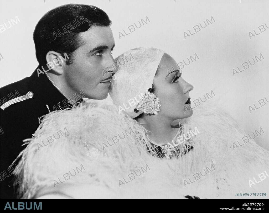 GLORIA SWANSON and JOHN BOLES in MUSIC IN THE AIR, 1934, directed by JOE MAY. Copyright FOX FILMS.