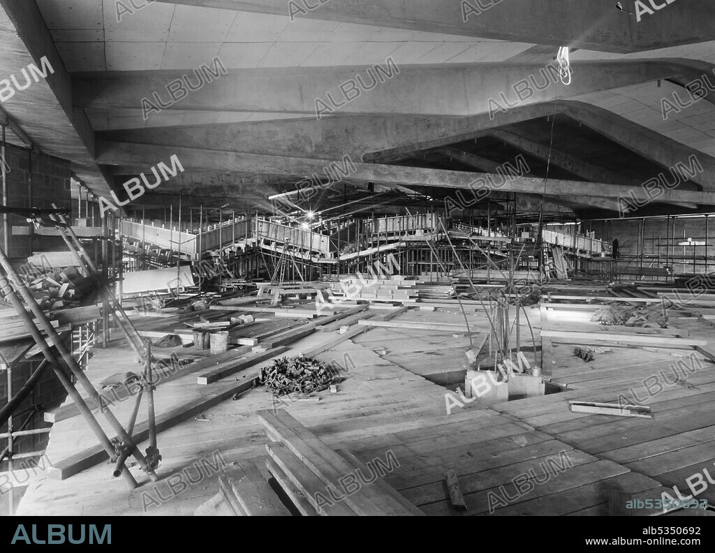 JOHN LAING PLC. A view underneath the roof of Coventry Cathedral from the top of scaffolding erected during the construction of the cathedral. This image was catalogued as part of the Breaking New Ground Project in partnership with the John Laing Charitable Trust in 2019-20.