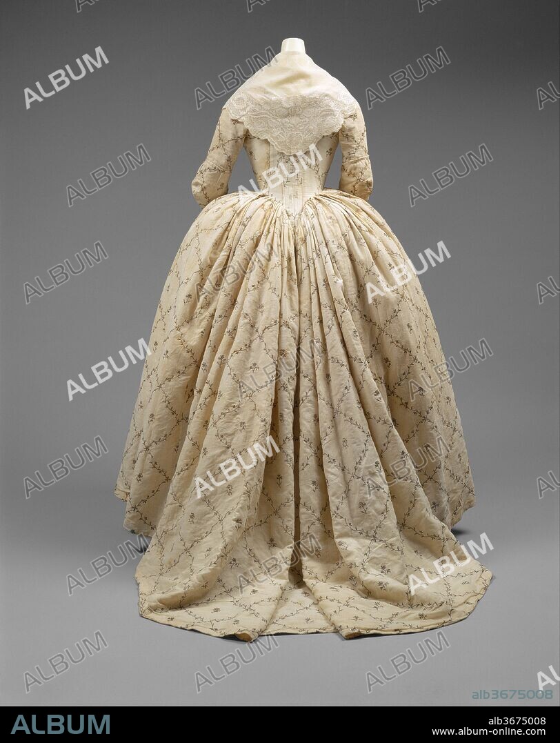 Robe à l'Anglaise. Culture: French. Date: 1784-87.
<p>Cotton emerged as a fashionable fabric in the 1780s with the <em>chemise à la reine</em>, the cotton shift favored by Marie Antoinette beginning in this turbulent decade. As always, clothing had political and international implications. One of the chief reasons the Lyon silk manufacturers railed against the reductive modern attire is that their luxurious silks were being abandoned in favor of imported cottons from India, confirmed in the costume on the right by a weaver's mark in the selvage.</p>.