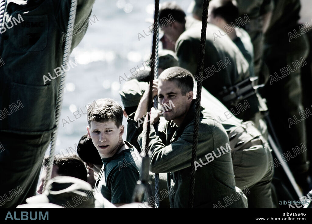 PAUL WALKER and STARK SANDS in FLAGS OF OUR FATHERS, 2006, directed by CLINT EASTWOOD. Copyright WARNER BROS. / WALLACE, MERIE W.
