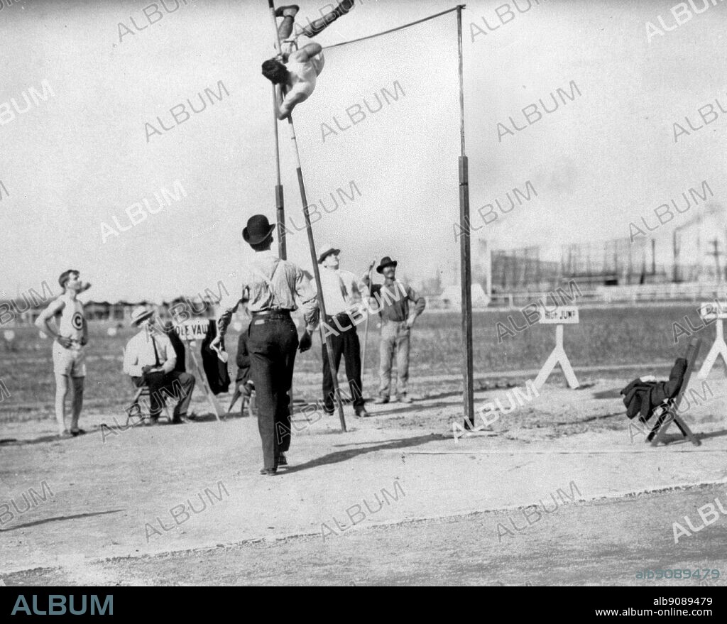Victory in the pole vault for Charles Dvorak (United States) at 3 50m 11ft 6in at the World Fair Olympic Games, St Louis, 1904. The Olympic Games page 54.