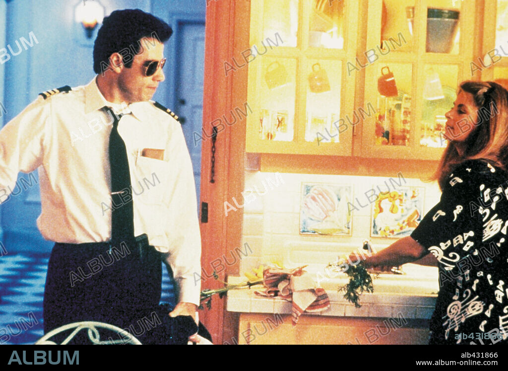JOHN TRAVOLTA and KIRSTIE ALLEY in LOOK WHO'S TALKING TOO, 1990, directed by AMY HECKERLING. Copyright TRI STAR PICTURES.
