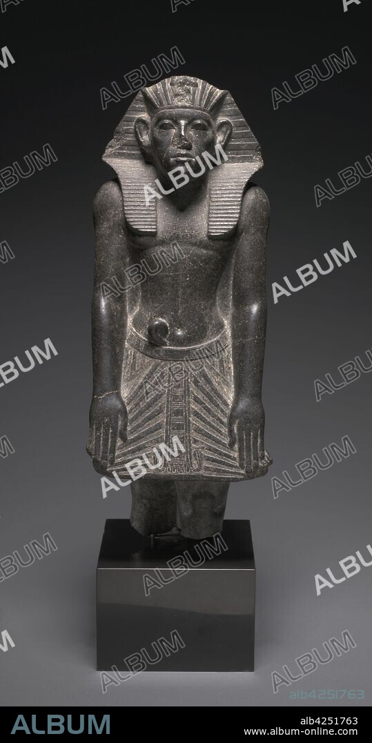 Statue of Amenemhat III, c. 1859-1814 BC. Egypt, Middle Kingdom, Dynasty 12 (1980-1801), reign of Amenemhat III. Granodiorite; overall: 51.2 x 19.8 x 18.4 cm (20 3/16 x 7 13/16 x 7 1/4 in.).