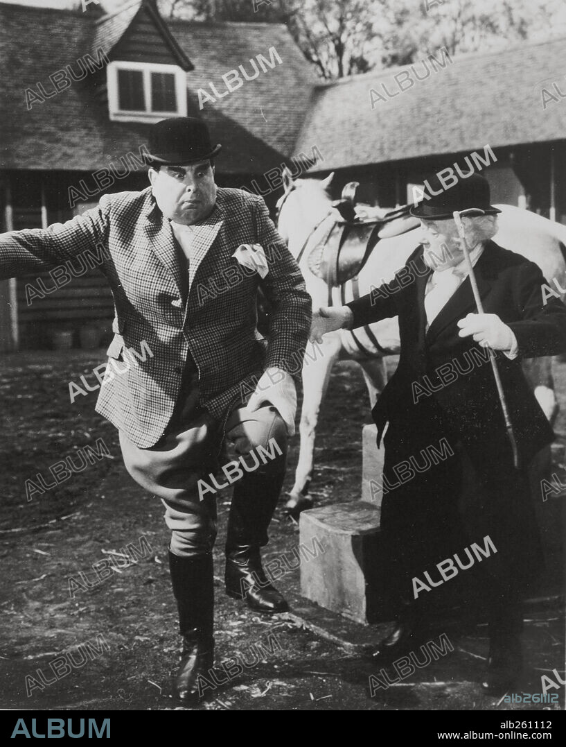 MARGARET RUTHERFORD and ROBERT MORLEY in MURDER AT THE GALLOP, 1963, directed by GEORGE POLLOCK. Copyright M.G.M BRITISH.