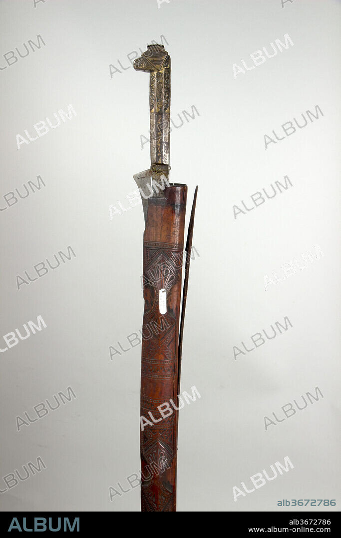 Sword (Flyssa) with Scabbard. Culture: Algerian, Kabyle. Dimensions: H. with scabbard 41 in. (104.1 cm); H. without scabbard 35 1/4 in. (89.5 cm); H. of blade 33 1/2 in. (85.1 cm); W. 1 1/2 in. (3.8 cm); Wt. 2 lb. 0.9 oz. (932.7 g); Wt. of scabbard 11.4 oz. (323.2 g). Date: 18th-19th century.