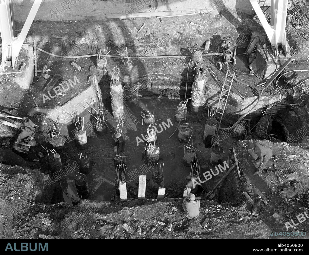 Excavations at Rossington Colliery near Doncaster, South Yorkshire, 1963. Civil engineers from Norwest Construction at work. The men are without any protective headgear or safety equipment.