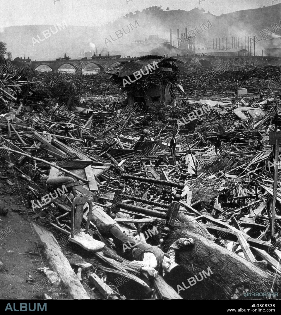 The Johnstown Flood (or Great Flood of 1889 as it became known locally) occurred on May 31, 1889. It was the result of the catastrophic failure of the South Fork Dam situated on the Little Conemaugh River 14 miles upstream of the town of Johnstown, Pennsylvania, made worse by several days of extremely heavy rainfall. The dam's failure unleashed a torrent of 20 million tons of water from the reservoir known as Lake Conemaugh. The flood killed 2,209 people and caused $17 million in damages.