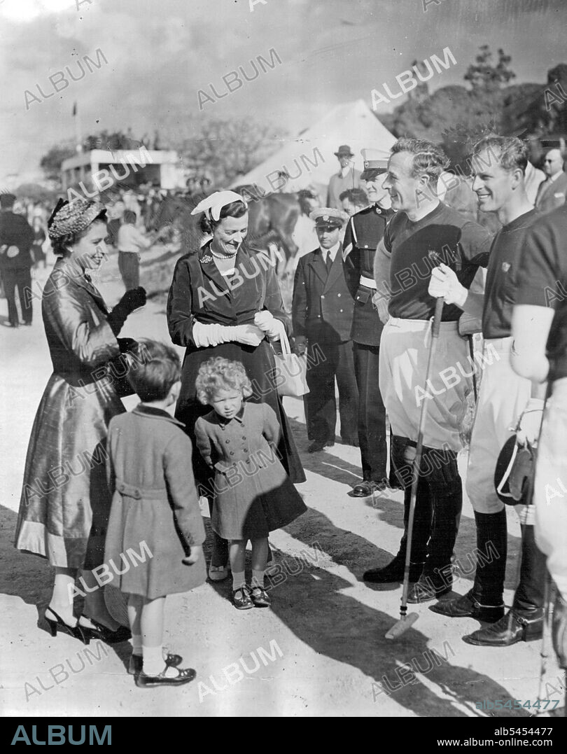 Thrill of the day for Prince Charles and Princess Anne a chat with Daddy and Uncle Dickie (Earl Mountbetten) at the Marsa polo ground, Malta. In the centre is Lady Mountbatten. With the Queen, the children had seen the Duke and Lord Mountbatten playing polo for the Navy against the Army The Navy won 4-2.Polo Match. Homeward bound after his Commonwealth tour with the Queen the Duke of Edinburgh took part in a Navy Army polo match at Malta. Navy won 4-2. Here the Royal children, accompanied by the Queen and Lady Mountbatten, were taken to see their father and Uncle Dickie (Earl Mountbatten) before the match began. Princess Anne seems more interested in something else. May 6, 1954. (Photo by Daily Mirror).