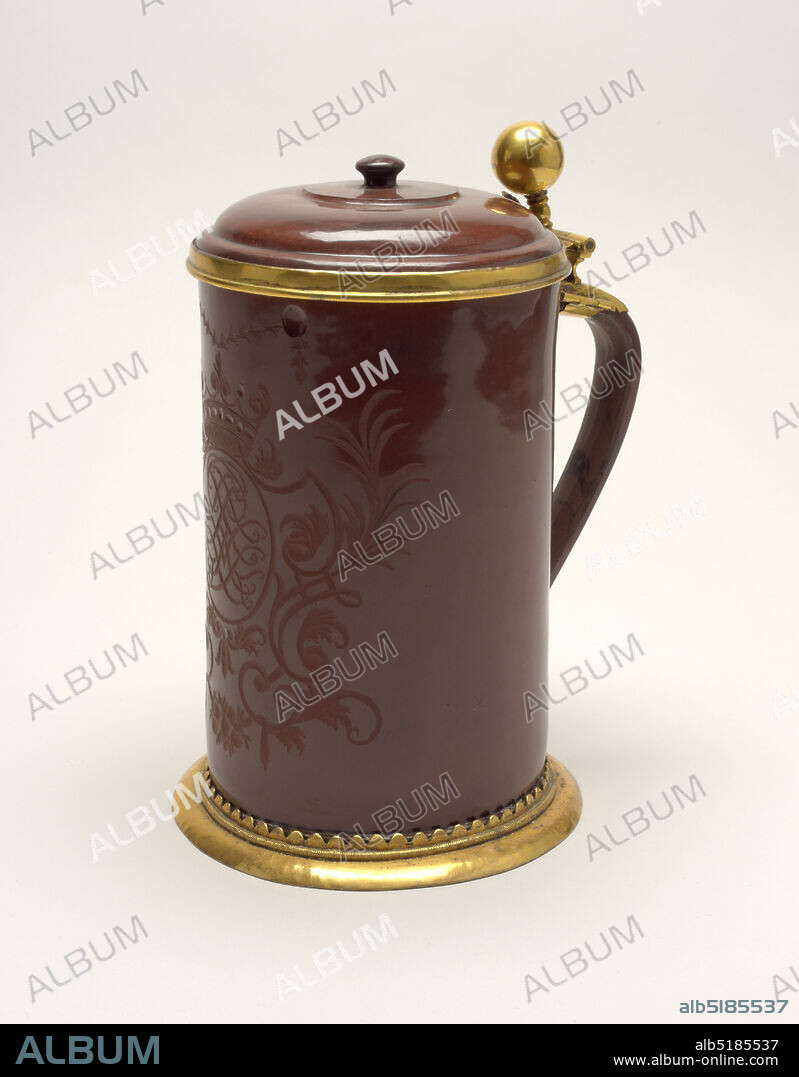 Böttger Stoneware Tankard, Meissen Porcelain Manufactory, German, active from 1710 to the present, Johann Friedrich Böttger, German, 1682 - 1719, stoneware, silver, gold, Cylindrical, slightly tapering toward top. Flat domed cover with simple button knob, held by ring mounting and hinge on shoulder of curving flat strap handle. Mount on foot, with triangular tongues holding the base of the tankard. Exterior of tankard, and both surfaces of cover, polished. Tankard engraved on face with interlacing cipher in framework of scrolls, under a crown., Meissen, Saxony (present-day Germany), ca. 1715, ceramics, Decorative Arts, tankard, tankard.