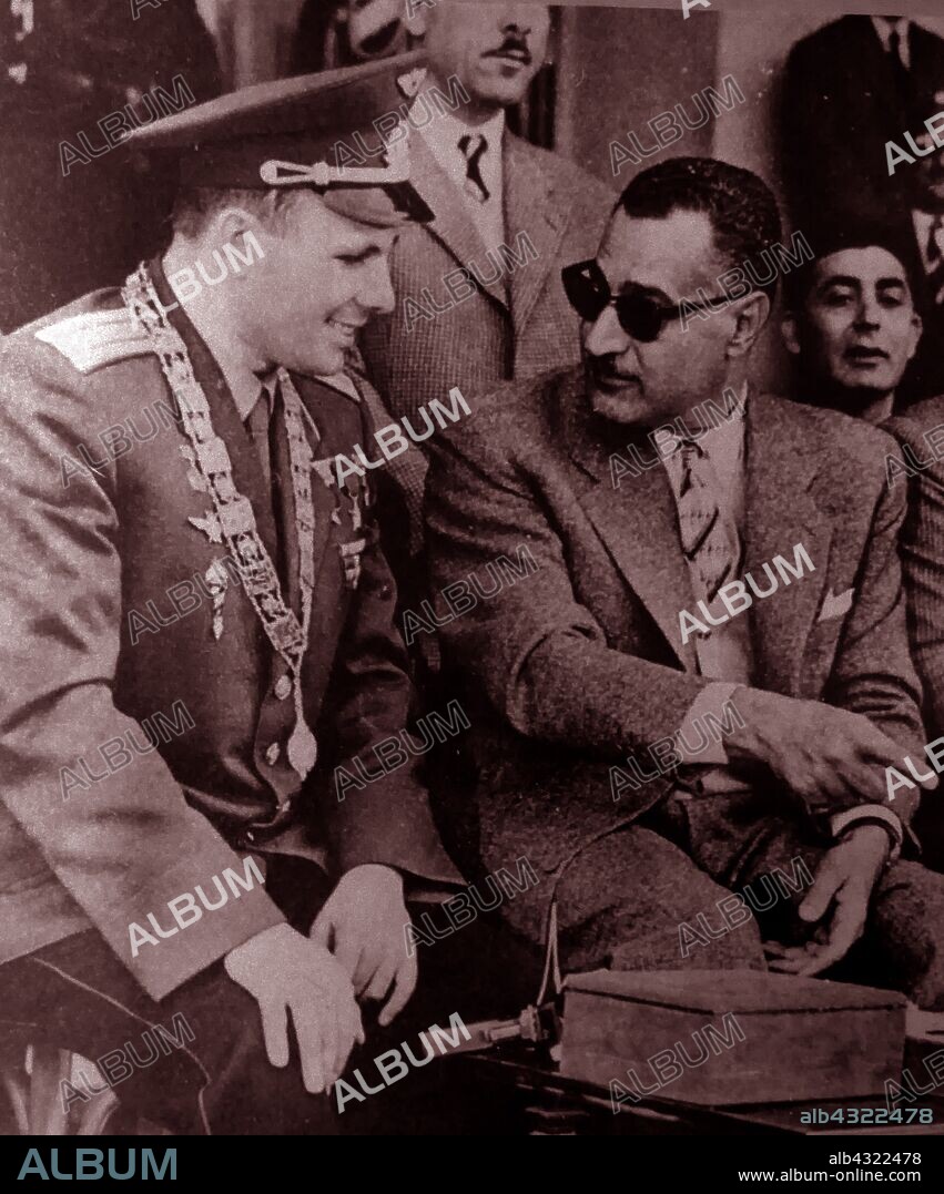 Yuri Gagarin and Gamal Abdel Nasser, Stadium in Cairo, Egypt, 1962. Gagarin  (1934 - 1968) was a Soviet pilot and cosmonaut. He was the first human to journey into outer space when his Vostok spacecraft completed an orbit of the Earth on 12 April 1961. .