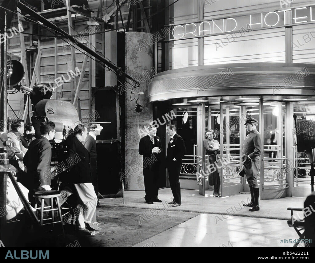 JOAN CRAWFORD, JOHN BARRYMORE and LIONEL BARRYMORE in GRAND HOTEL, 1932, directed by EDMUND GOULDING. Copyright M.G.M.