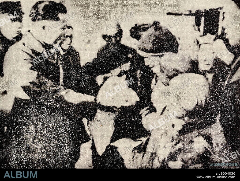 Students came to slum areas to deliver winter clothes. This was during the continuous days of snow in Shanghai that froze people to death.
