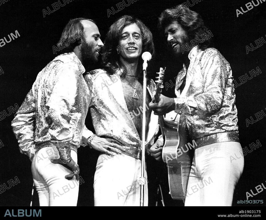 FILE - ROBIN GIBB, the pop music legend who co-founded the Bee Gees with his brothers in 1958 and recorded a string of hits including 'Stayin' Alive,' 'How Deep Is Your Love,' 'Massachusetts' and 'Night Fever,' died Sunday May 20, 2012 after a lengthy battle with cancer. He was 62. PICTURED: Undated photo of the Bee Gees (L-R) MAURICE GIBB, ROBIN GIBB and BARRY GIBB performing. 20/05/2012