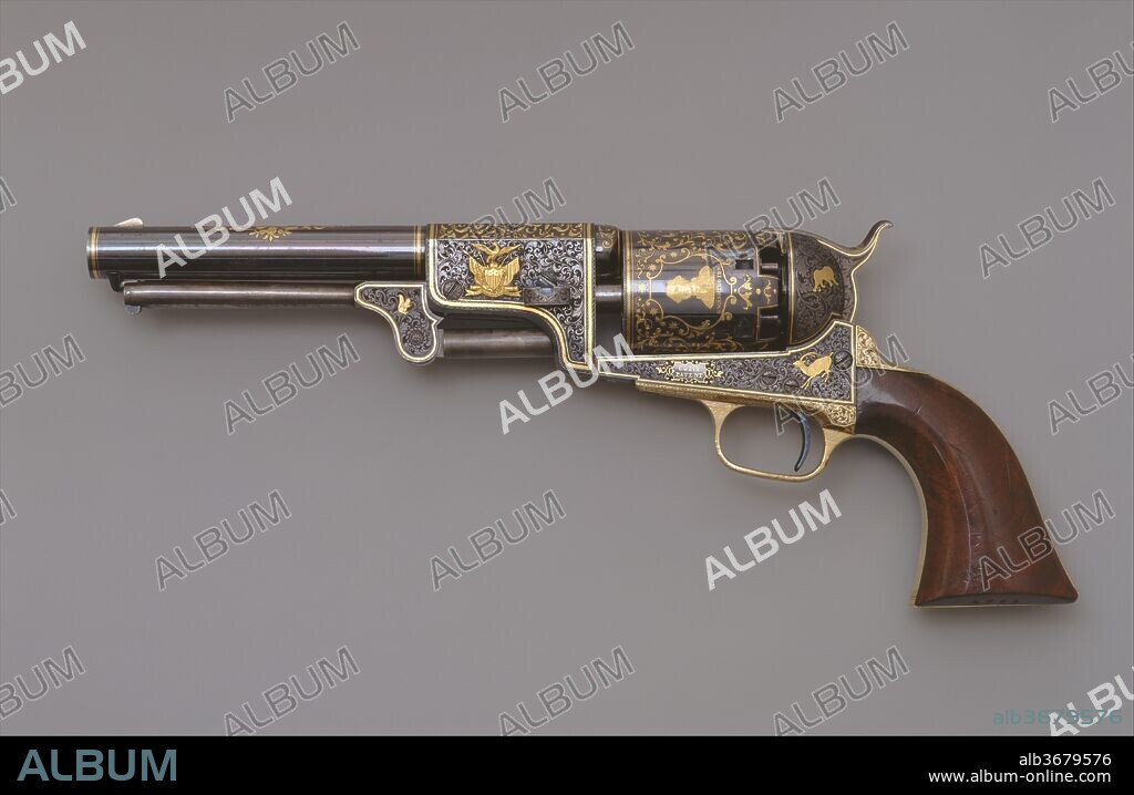 Colt Third Model Dragoon Percussion Revolver, Serial Number 12406. Culture: American, Hartford, Connecticut. Dimensions: L. 14 in. (35.6 cm); L. of barrel 7 1/2 in. (19.1 cm); Cal. .44 in. (11.2 mm); case; H. 3 in. (7.6 cm); W. 16 3/16 in. (41.1 cm); D. 8 1/8 in. (20.6 cm); Wt. 3 lb. 9.8 oz. (224 g). Manufacturer: Samuel Colt (American, Hartford, Connecticut 1814-1862). Date: ca. 1853.
Samuel Colt (1814-1862) was one of the most famous and successful American inventors and entrepreneurs of the early industrial age. By patenting the first mass-produced multishot revolving firearms, Colt achieved worldwide fame and a vast personal fortune. His introduction of precise machine-made weapons and his promotion of the interchangeability of parts were innovations that transformed the arms industry. Colt actively promoted sales through advertising and displays at international fairs, and by presenting deluxe arms to men of influence, including heads of state. His precise and reliable standard-model revolvers were highly valued by soldiers and frontiersmen. His more elaborately embellished exhibition and presentation arms appealed as functional objects of beauty.
The Museum's revolver is considered one of Colt's finest. Apparently, it was created as part of a set of three pairs of gold-inlaid revolvers that Colt took with him to Europe in 1854. That year saw the outbreak of the Crimean War, which pitted Russia against Turkey and her allies, Great Britain and France. Colt aggressively marketed arms to both sides. In November 1854, he presented three gold-inlaid revolvers, one example from each pair, to Czar Nicholas I of Russia. Of these, the Third Model Dragoon serial number 12407 (now in The Hermitage, Saint Petersburg) is actually the mate to the Museum's pistol, serial number 12406. The gift clearly demonstrated the technical and artistic aspects of Colt's product, while its patriotic motifs proudly proclaimed its American origin.