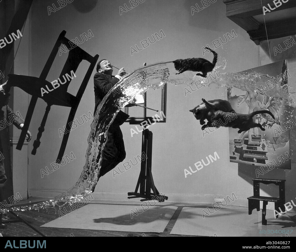 SALVADOR DALI (1904-1989).Spanish painter. Photographed with objects, including cats and water caught in surreal motion. Photographed by Philippe Halsman, c1948.
