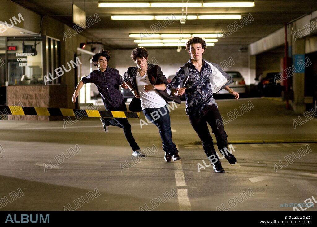 JOE JONAS, KEVIN JONAS and NICK JONAS in JONAS BROTHERS: THE 3D CONCERT EXPERIENCE, 2009, directed by BRUCE HENDRICKS. Copyright Chapman-leonard studio equipment/ film source/ / EMERSON, SAM.