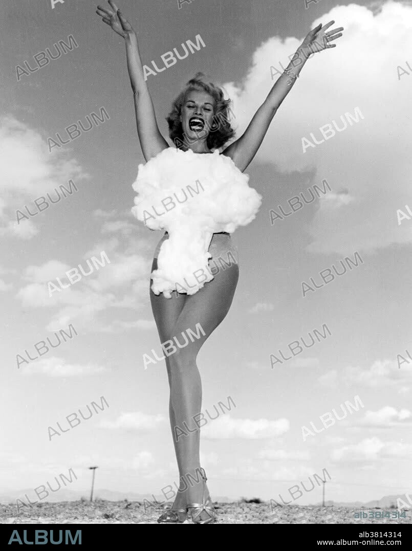 On May 24, 1957, the Las Vegas News Bureau released the last, and arguably, most famous "Miss Atomic Bomb" photo of all to coincide with Operation Plumbbob at the Nevada Test Site. All Las Vegas Strip hotel showrooms had their own lines of showgirls, who performed in between the famous headliners. Donald English took the famous Miss Atomic Bomb photo of Copa showgirl Lee A. Merlin at the Sands Hotel. With a cotton mushroom cloud added to the front of her swim suit, the publicity photo of the last Miss Atomic Bomb has appeared and continues to appear in hundreds of publications worldwide.