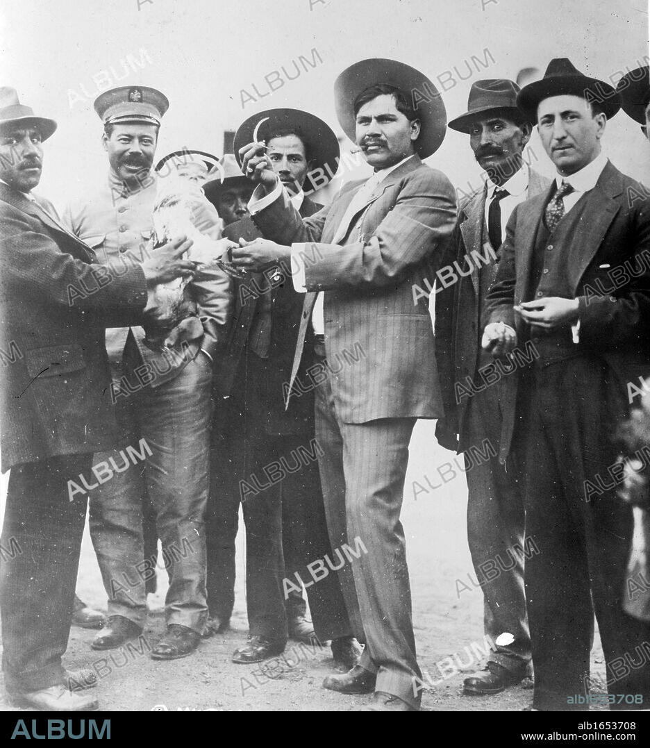 Francisco Pancho Villa, born Doroteo Arango Arambula (1878-1923), Mexican Revolutionary General. Villa, second left in military cap, with Raul Madero, c1923, Villa was ambushed and assassinated on 20 July 1923.
