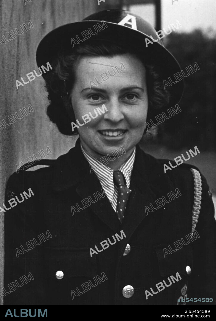 Scenes From "Doodle-Bug" Alley, Southern England - A typical specimen of a girl ambulance driver who has served since 1939 against the Blitz and the "Doodle-bugs". She is Miss Toni Leach. She has had her own home wrecked by the "doodle-bug". September 18, 1944. (Photo by London News Agency Photos Ltd.).