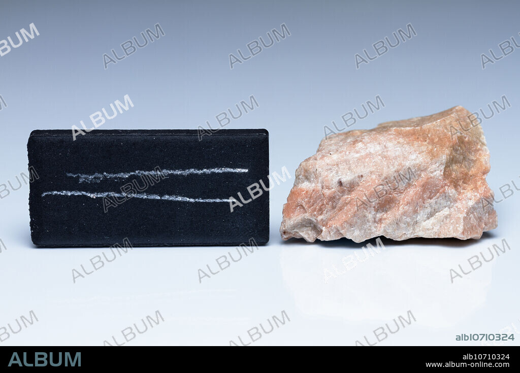 Feldspar streak test. The streak test is used to determine the colour of a mineral in powdered form. It is done by scraping a specimen across a piece of unglazed porcelain known as a streak plate. Feldspar has a white streak. It is a tectosilicate mineral. Feldspar is defined to have hardness of 6 in the Mohs scale.