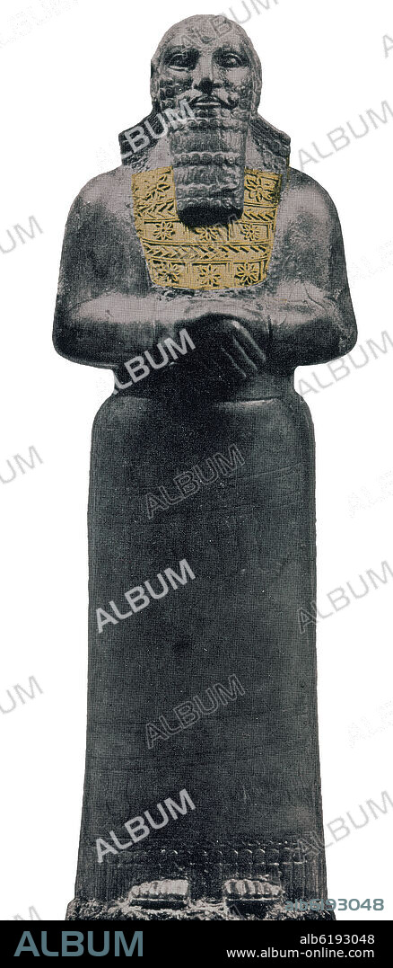 ESTATUILLA DE AMBAR DEL REY ASSUR-NASIRPAL CON PECTORAL DE ORO - 19 cm.