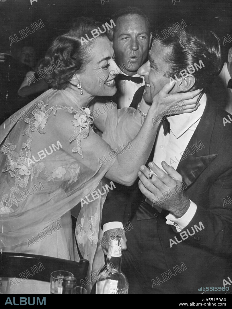 Joan Crawford, Peter Lawford. June 20, 1952.