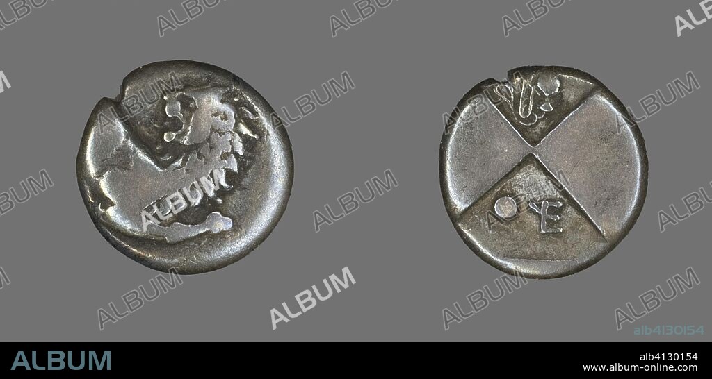 ANCIENT ROMAN. Hemidrachm (Coin) Depicting a Lion. Thracian, minted in Chersonesus. Date: 450 BC-400 BC. Dimensions: Diam. 1.3 cm; 2.32 g. Silver. Origin: Roman Empire.