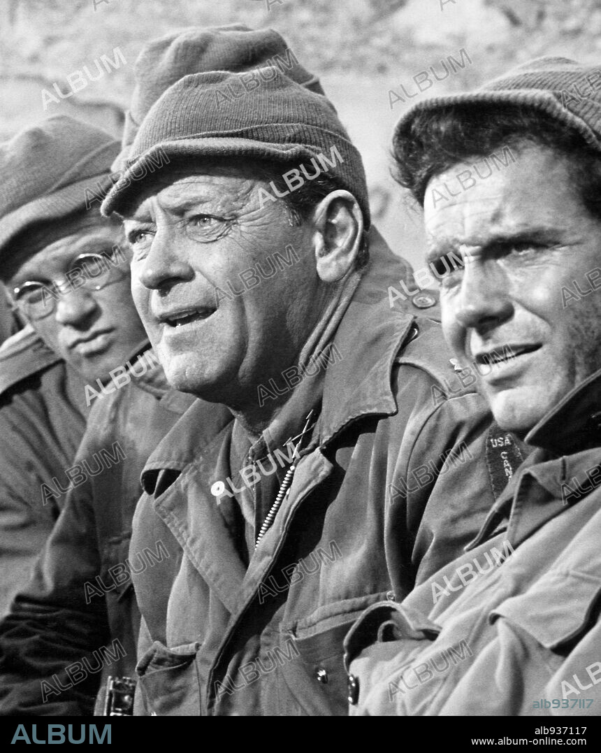 CLIFF ROBERTSON and WILLIAM HOLDEN in THE DEVIL'S BRIGADE, 1968, directed by ANDREW V. MCLAGLEN. Copyright UNITED ARTISTS.