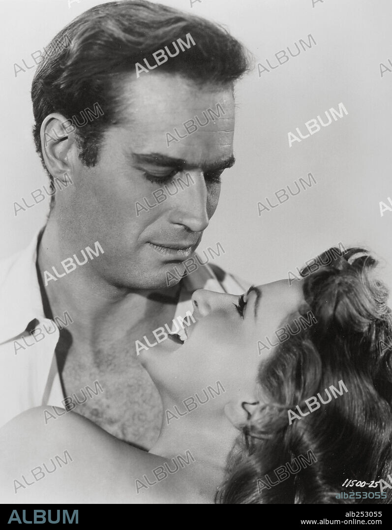 CHARLTON HESTON and NICOLE MAUREY in THE SECRET OF THE INCAS, 1954, directed by JERRY HOPPER.