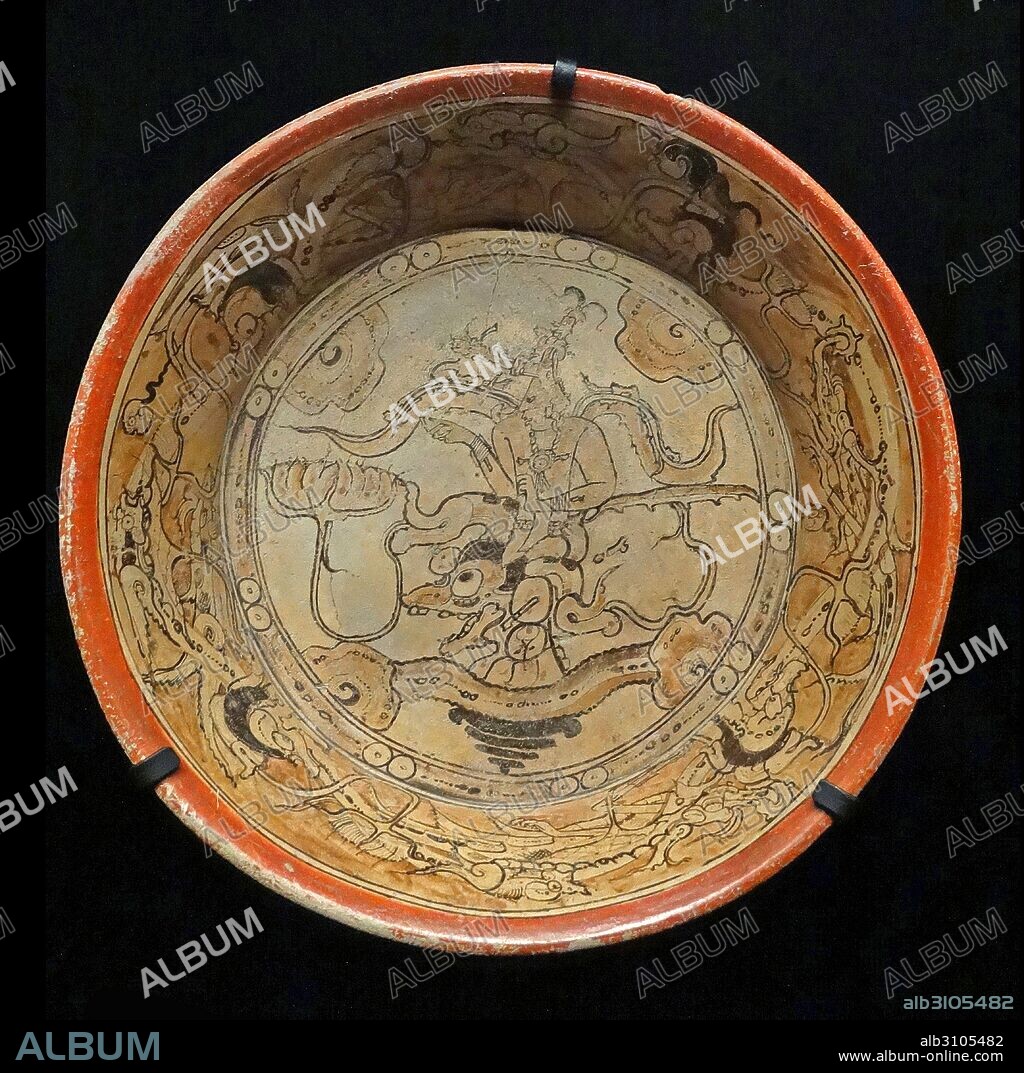 Mayan plate, made from terracotta. From Calakmul, Mexico, 600-1000 AD, depicts a dignitary with marine themes suggested.
