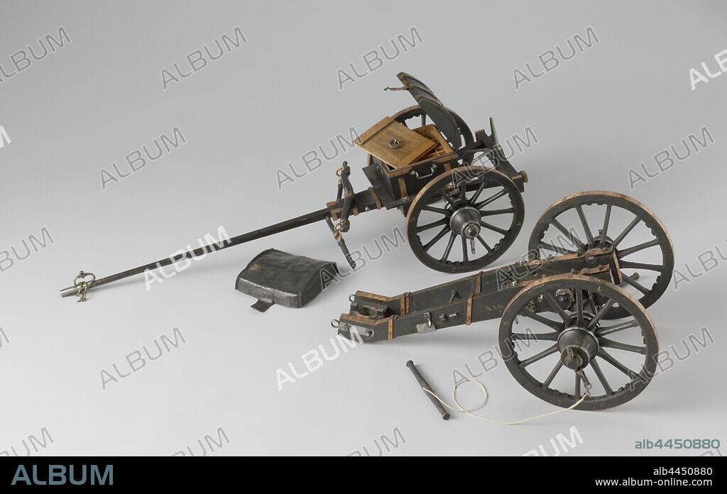 Ammunition car belonging to a bronze artillery model of a short 3-pounder on casing, Bronze model of a short 3-pounder on casing and with ammunition front car. The case is marked on the right cheek A 3 lb. M.K.N.1 and 1/6. The mark A 3 lb is on the left cheek. M.L. to find. The mark N = 1 and 't 1/6 are affixed to the hub of the two wheels. The N = 1 mark is applied to the front car on both hubs and to the rear of the axle body. The cannon and the tow bars of the front wagon are missing, as well as the loading tools., bronze (metal), wood (plant material), l 75 cm × w 32 cm × h 19 cm.